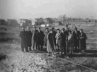 Heath Long, Mayor George A. Iseley and Mrs. Louis V. Sutton break ground for new drama center (1939)
