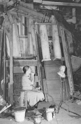 Margaret Darst at work in the scene shop in the basement of RLT (1940).