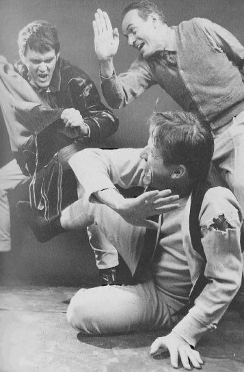 Art Anderson (left), Bob Brickell and Roland Lashley (floor) clash in The Caretaker (1968-1969)