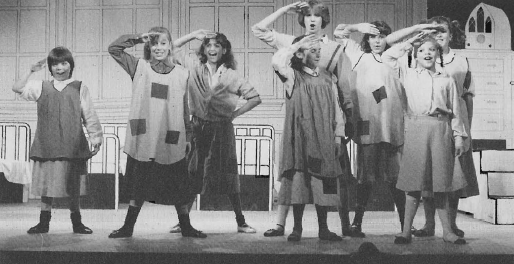 The orphans from Annie (1983): from left, Meredith Nicholson, Heather Butler, Stacey Harris, Sallie Permar, Bess Andrews, Heather Lynch, Anna Bowen and Natalie Gaskins.